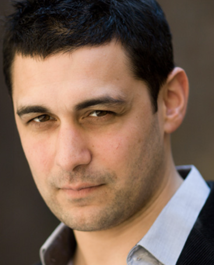 Head shot photo Adam Rutherford